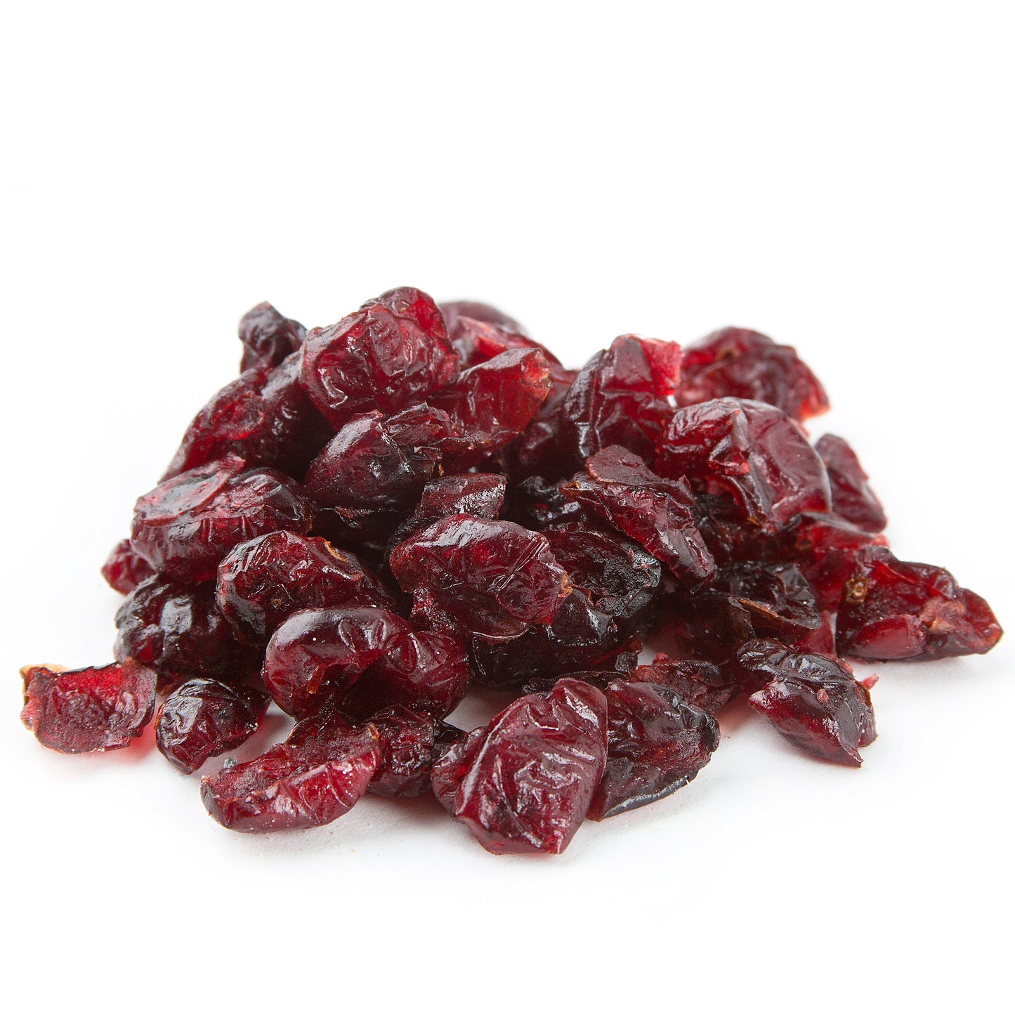 Pile of Dried Cranberries with a shiny, dark red appearance on a white background.