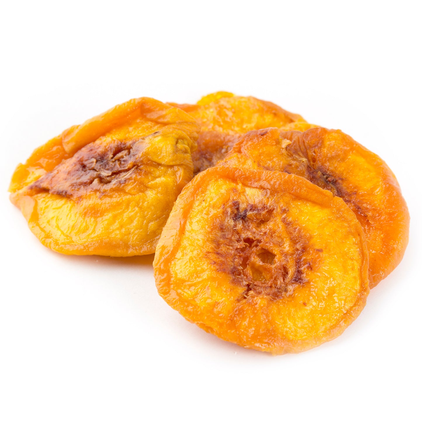 Sliced dried California peaches with a golden yellow color, arranged on a white background.